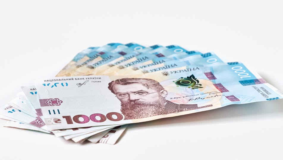 На фото зображено віяло з українських банкнот номіналом 1000 гривень
