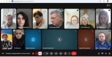 Скріншот відеоконференції Google Meet, що показує 12 учасників у вікнах та нижню панель інструментів із часом і назвою зустрічі.
